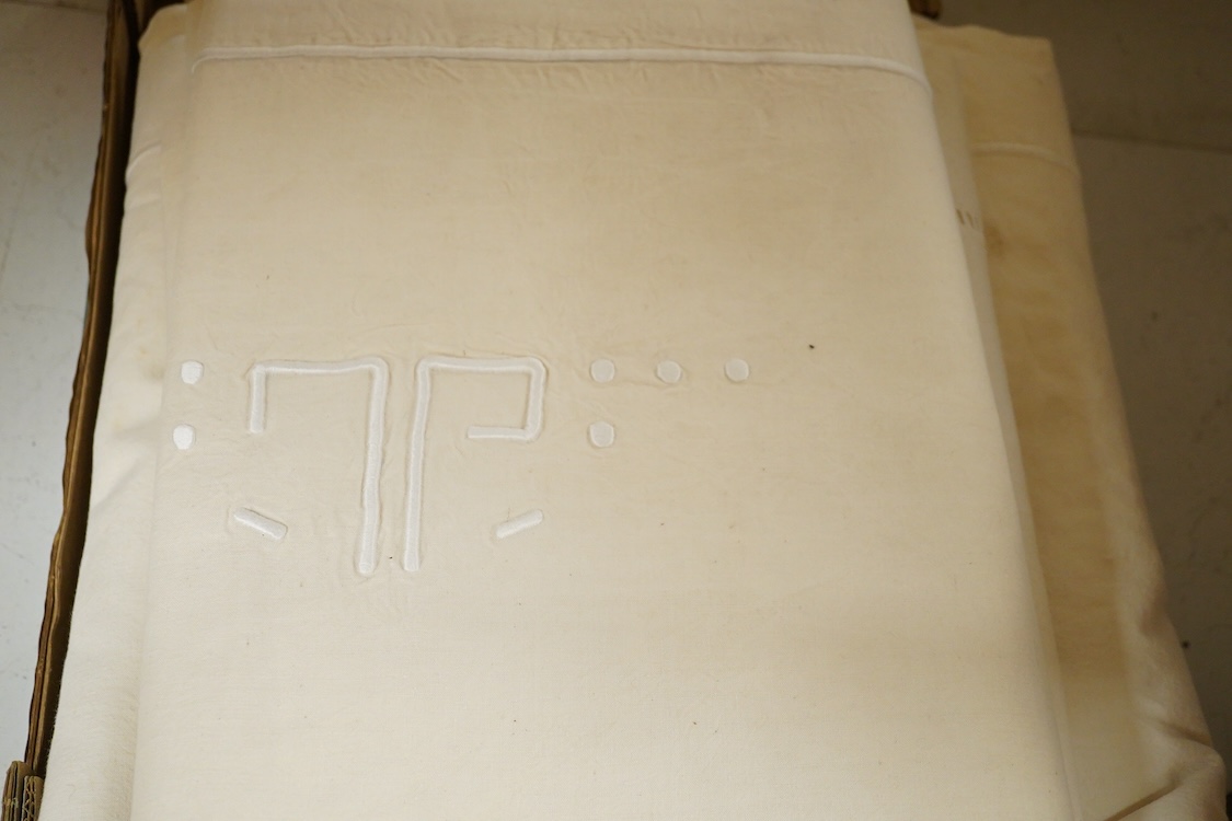 Seven French provincial coarse linen sheets, with a drawn thread bordered large white monogrammed turn backs